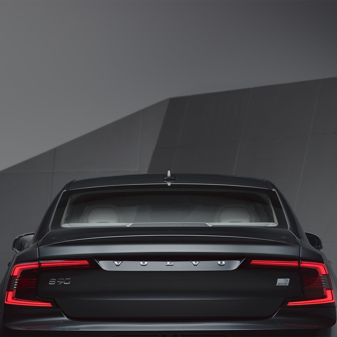 The rear exterior of a Volvo S90 Recharge.