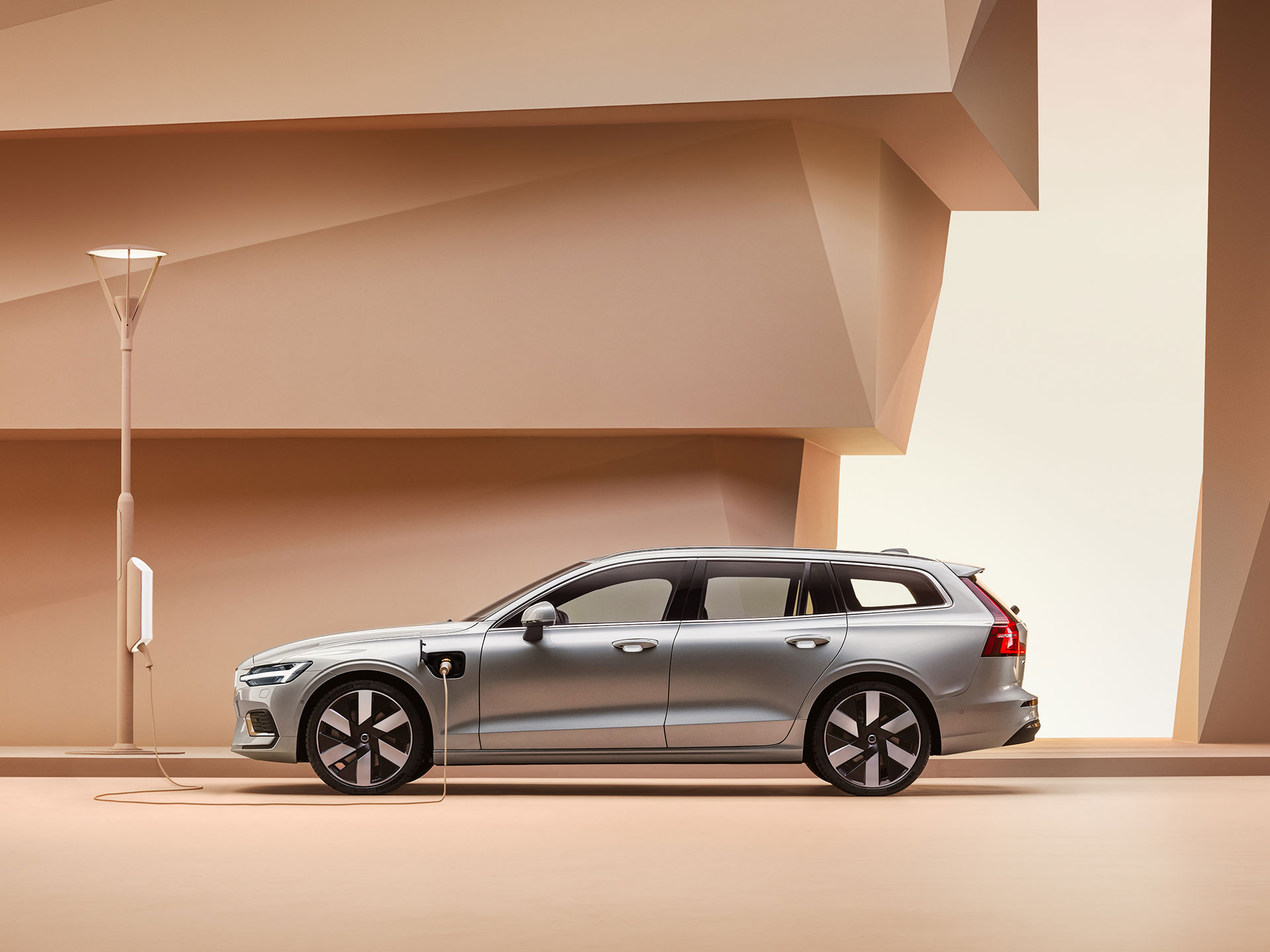 The side profile of a Volvo V60 Recharge estate.