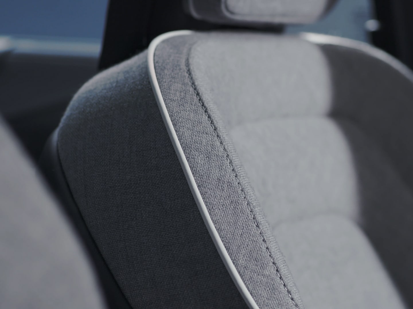 Interior close-up of the leather free Tailored Wool Blend seats in a Volvo XC90 Recharge.