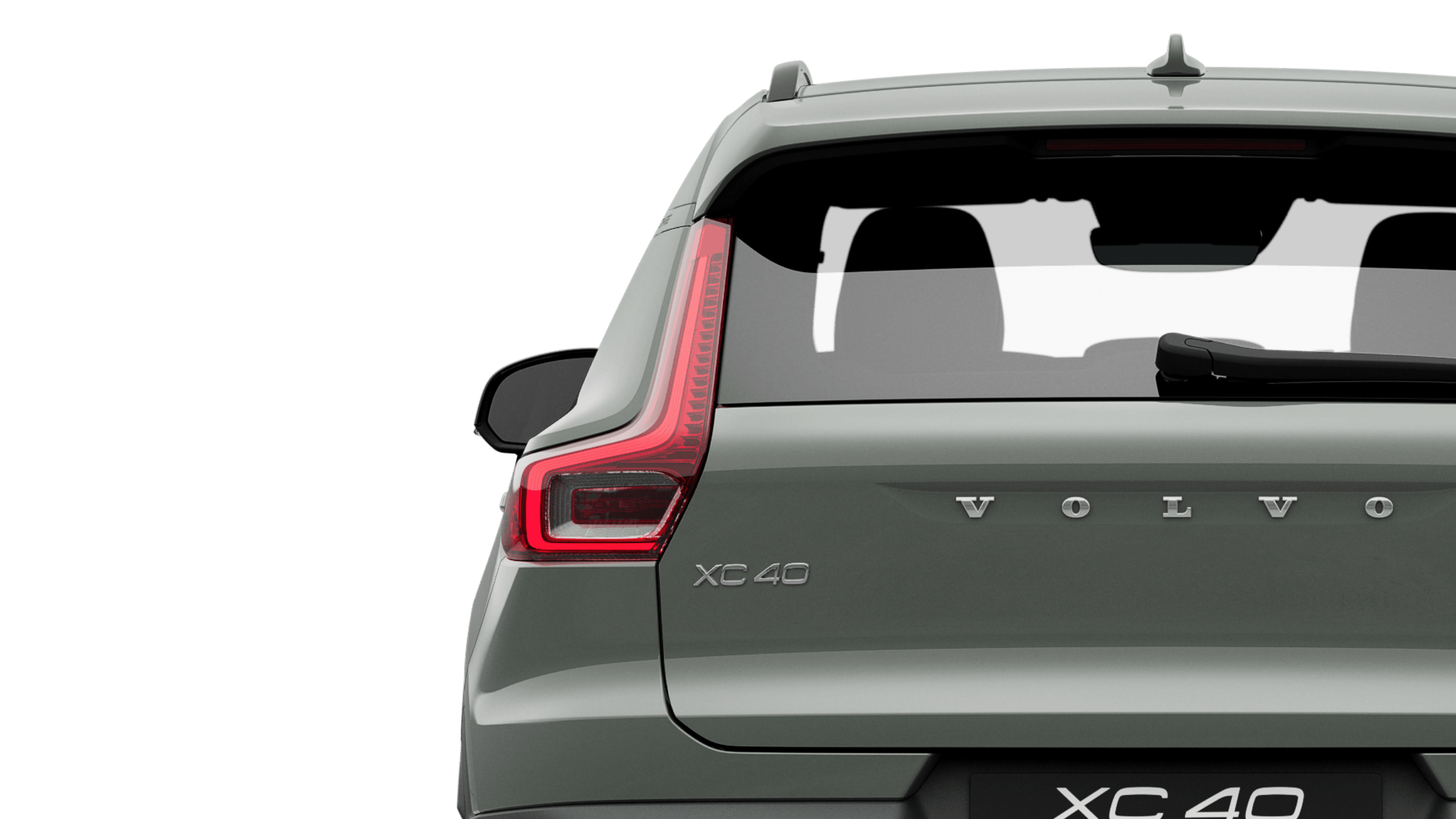 Szarozielone w pełni elektryczne Volvo XC40 Recharge, stojące w miejscu