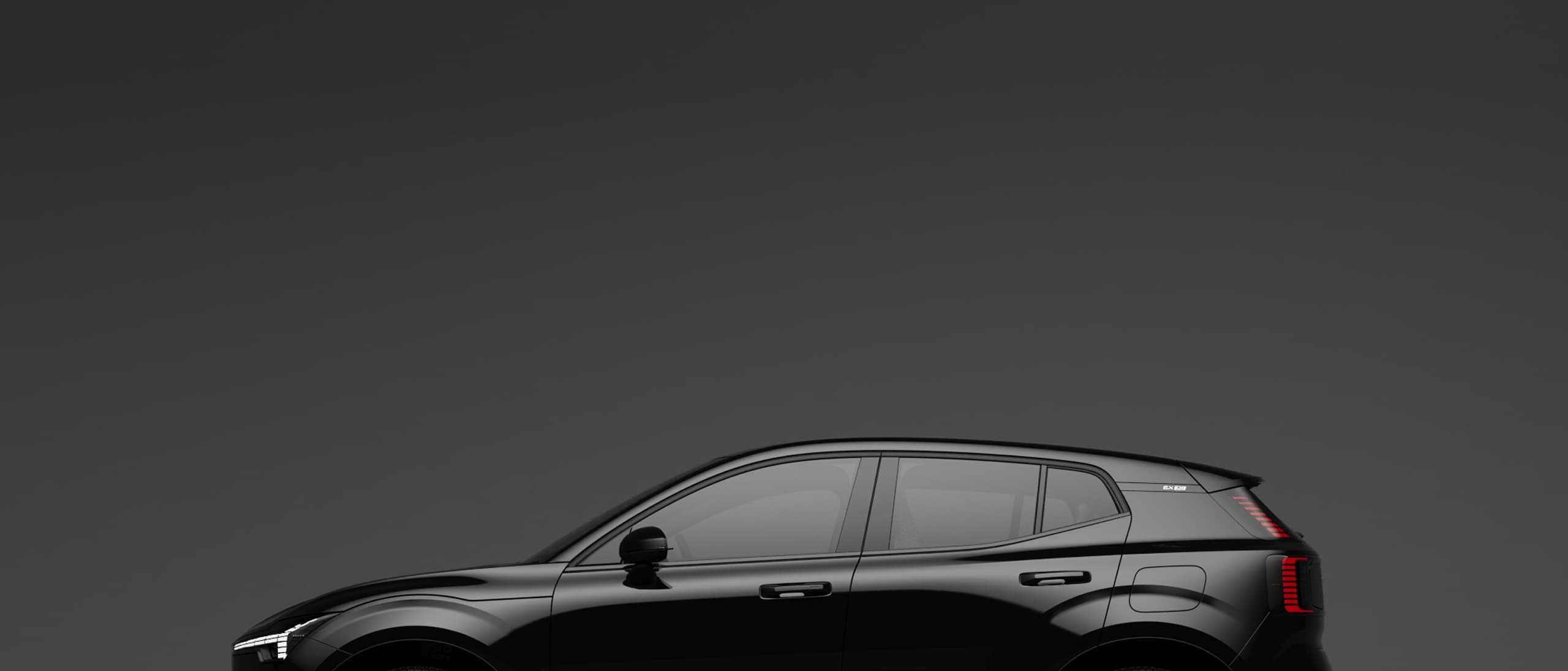 Side profile of the fully electric Volvo EX30 SUV in onyx black cropped in half.