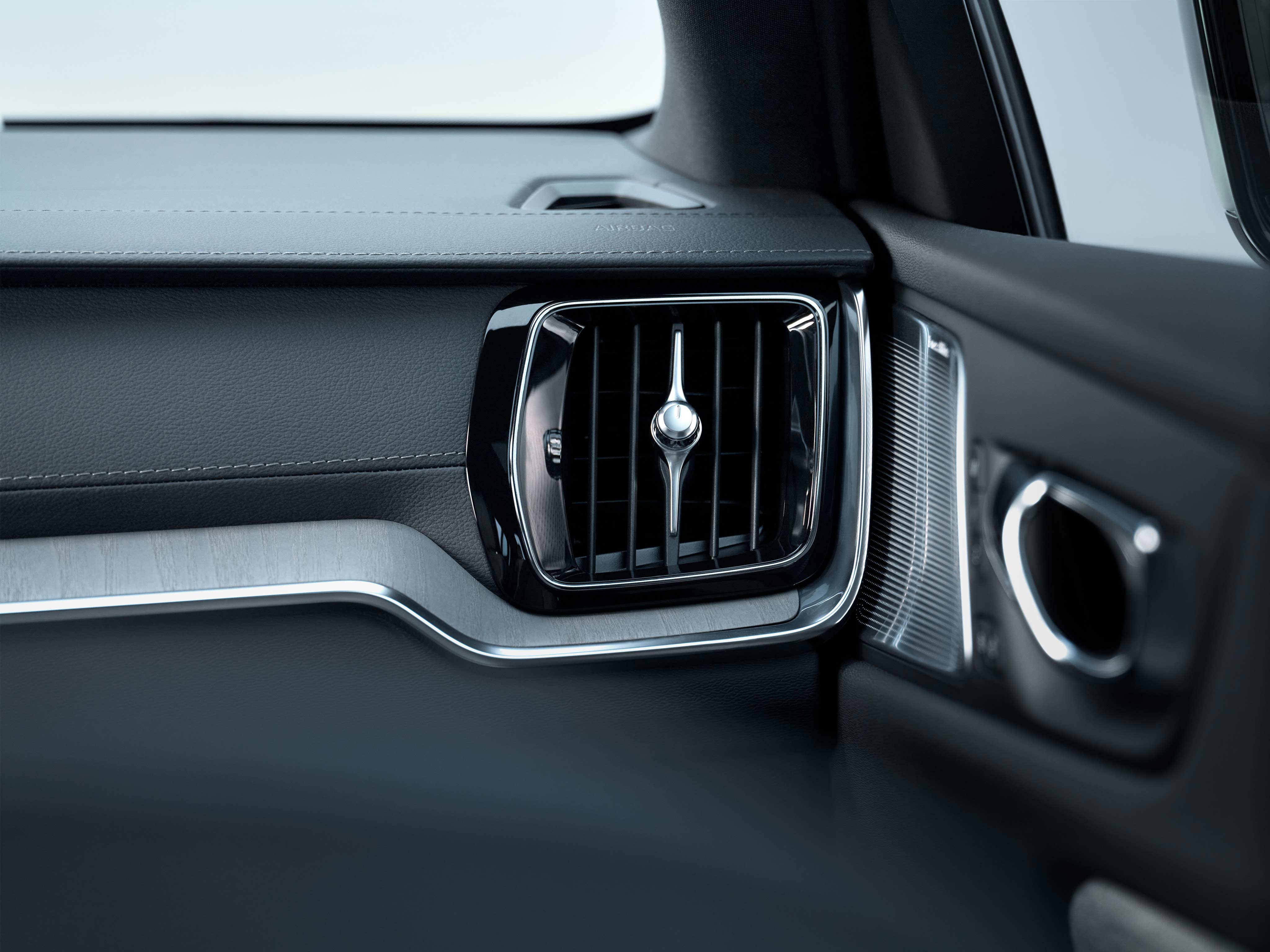Detail of an air vent in Volvo interior.