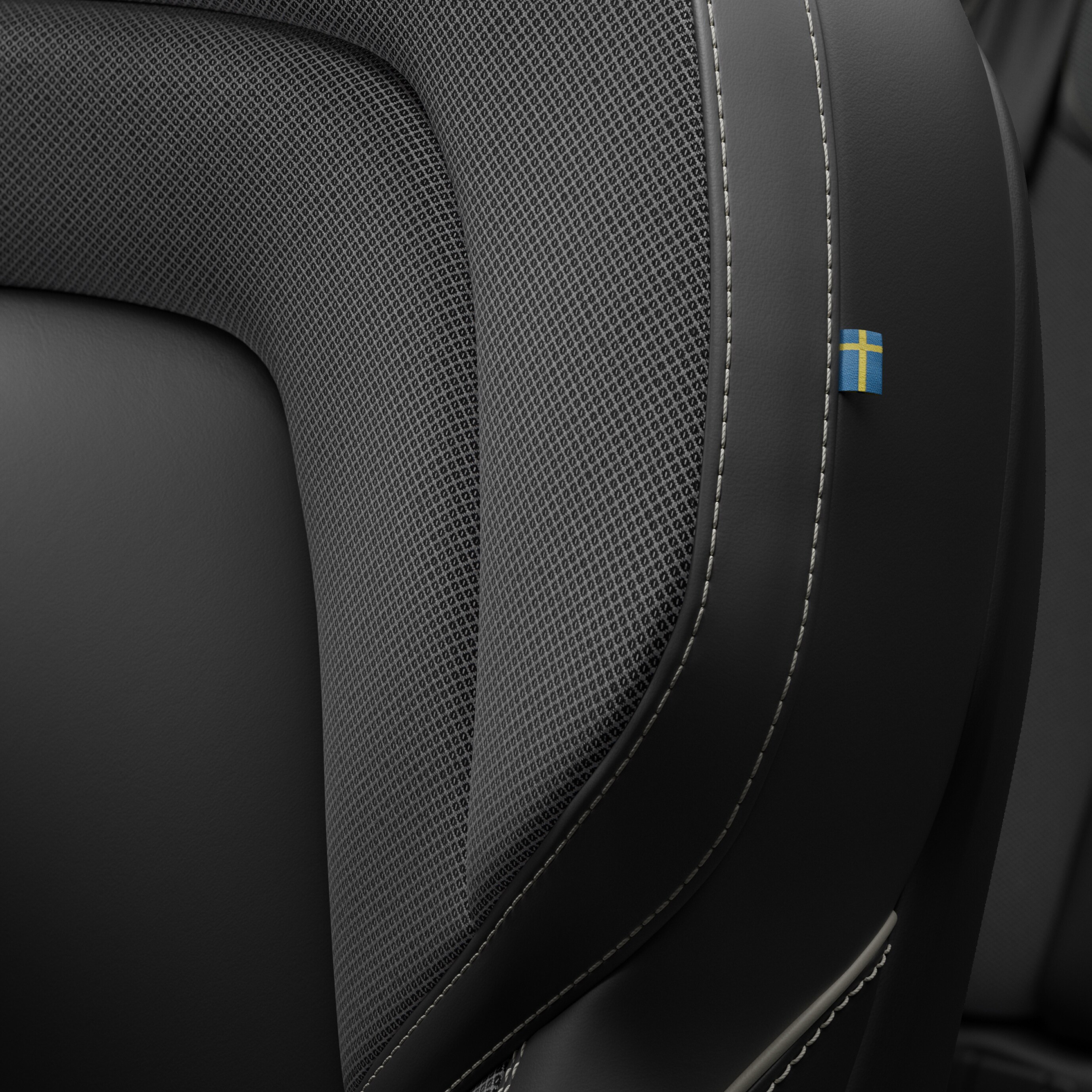 Interior close-up of the Tailored Wool Blend upholstery in the Volvo S60 Recharge.