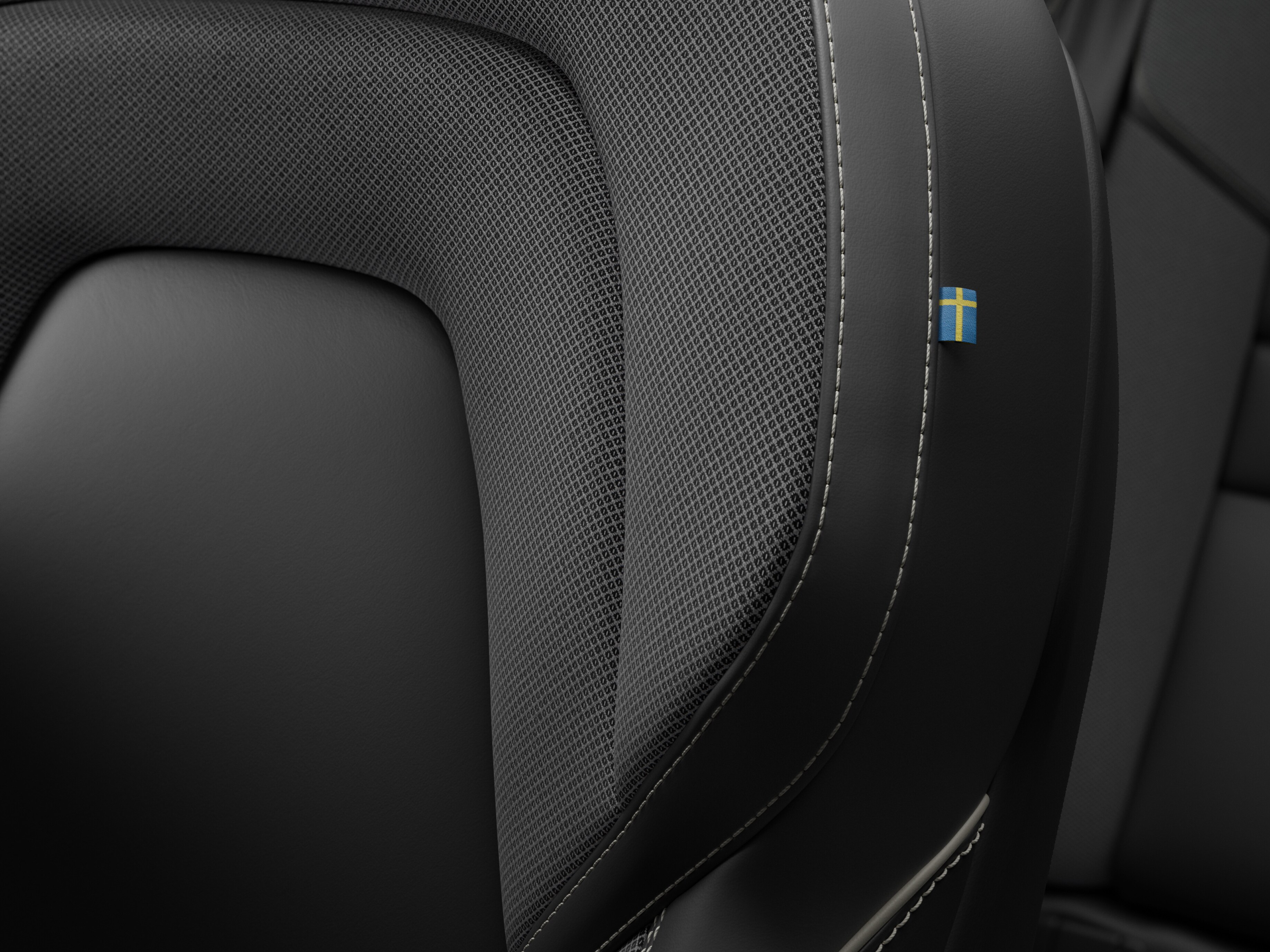 Interior close-up of the Tailored Wool Blend upholstery in the Volvo S60 Recharge.