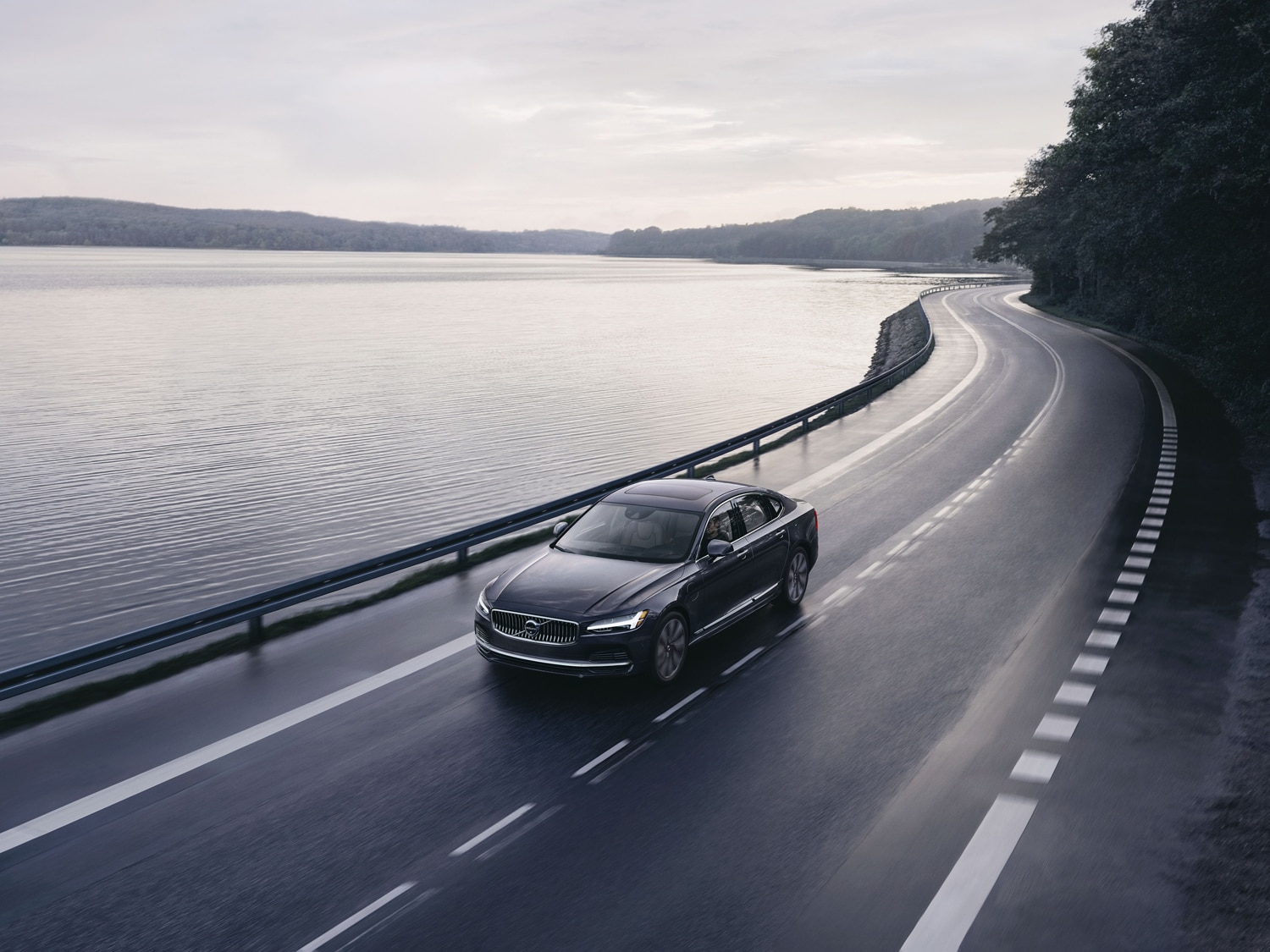 Build and Order a Volvo - Car driving by water