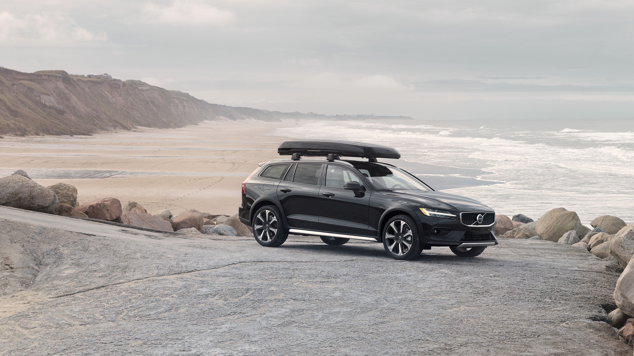 Volvo Overseas Roadside Assistance Europe - SUV parked by a beach