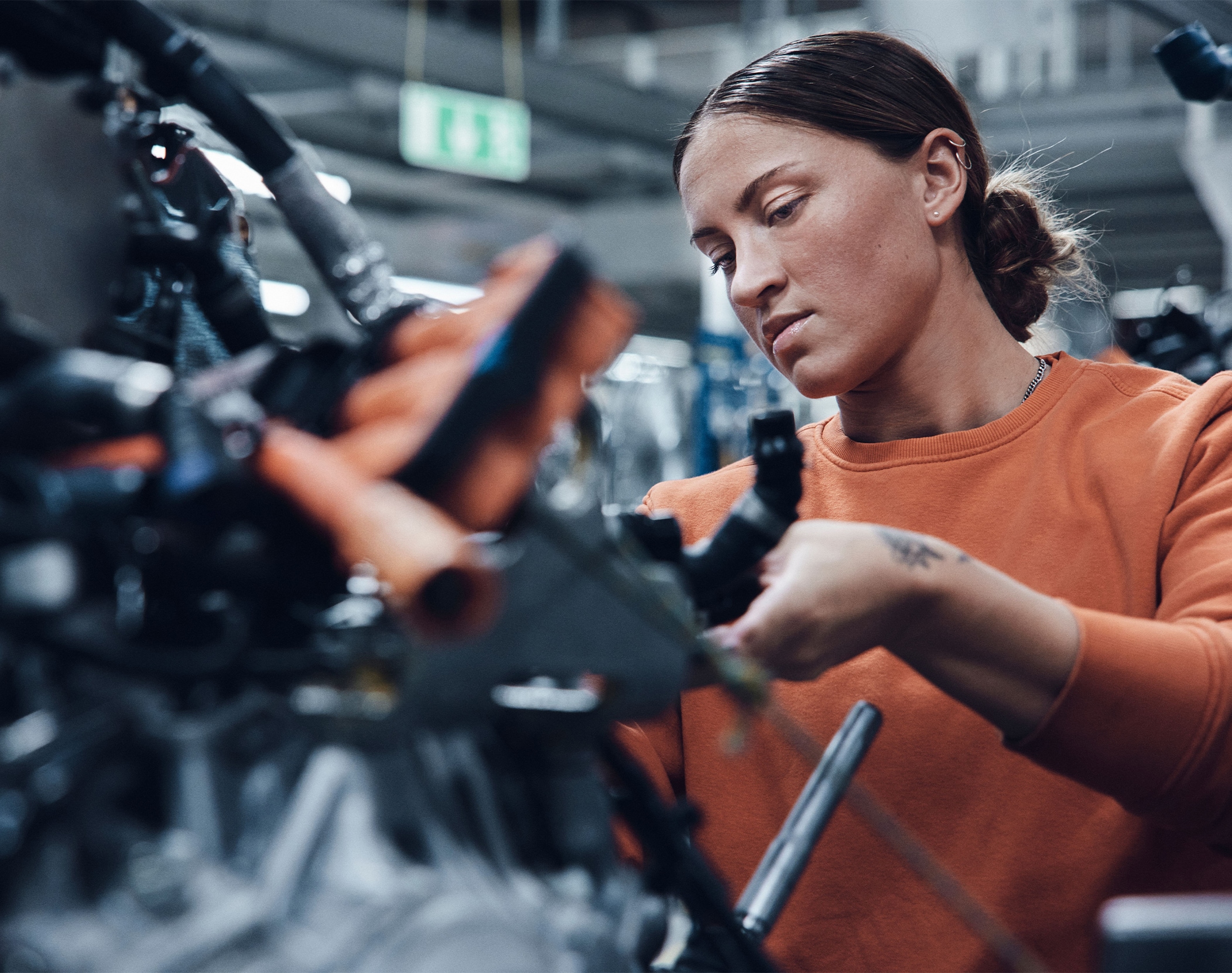 Woman Building Car in Plant - Career Opportunities at Volvo South Carolina Plant