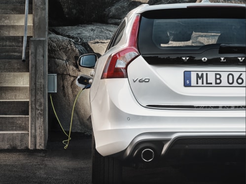 Volvo V60 diesel plug-in hybrid with the charging cable connected.