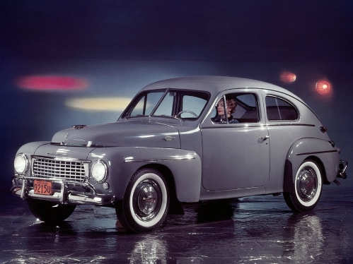 A grey Volvo PV 44 on a stage.