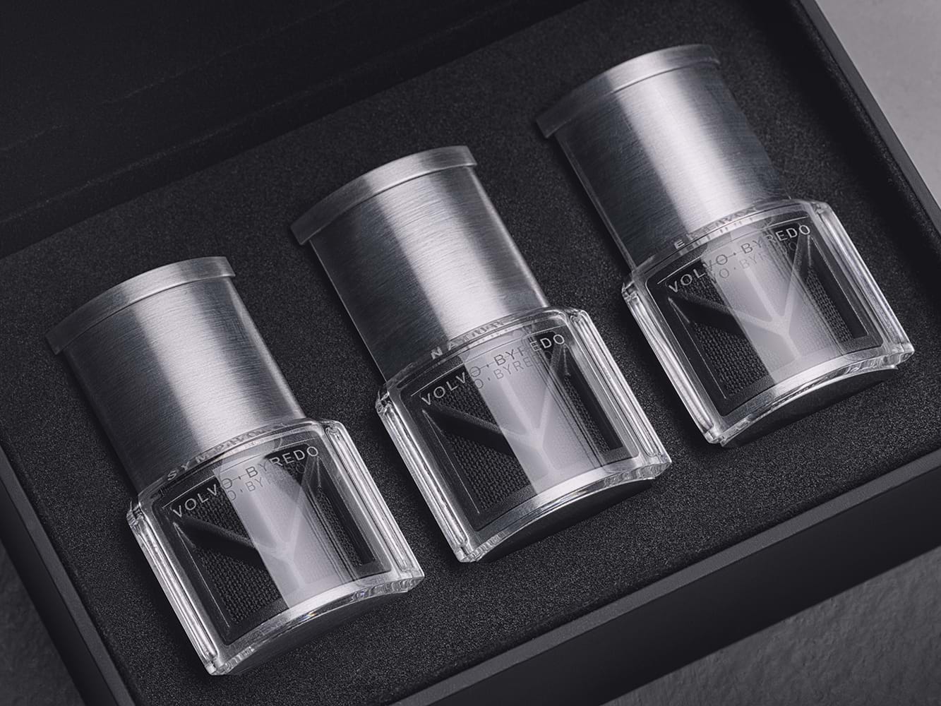 A box containing three small bottles of Byredo scents developed for the Volvo Ambience Interior concept