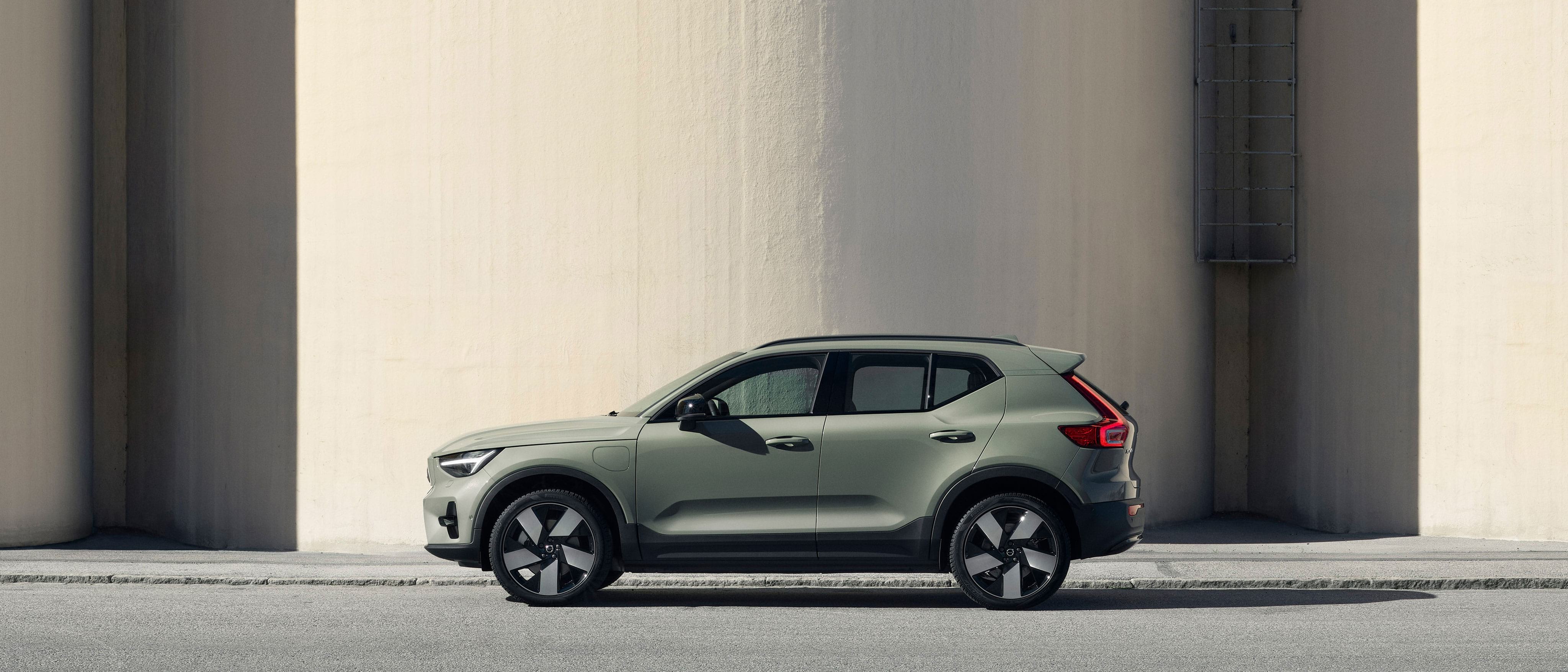 A green Volvo XC40 Recharge SUV with reimagined design details.