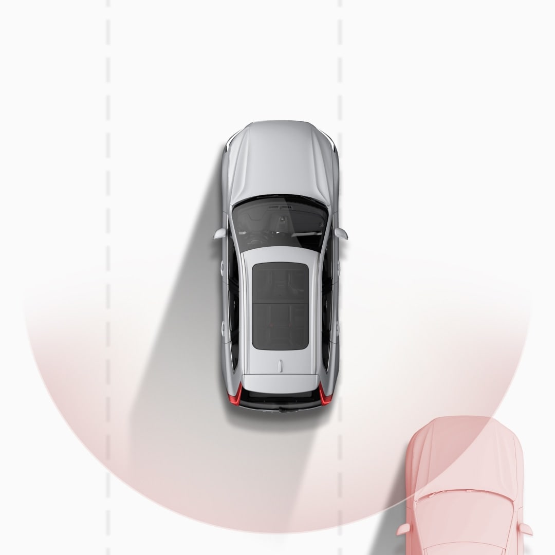 Illustration du Blind Spot Information System avertissant qu’une voiture s’approche par l’arrière dans une voie adjacente.