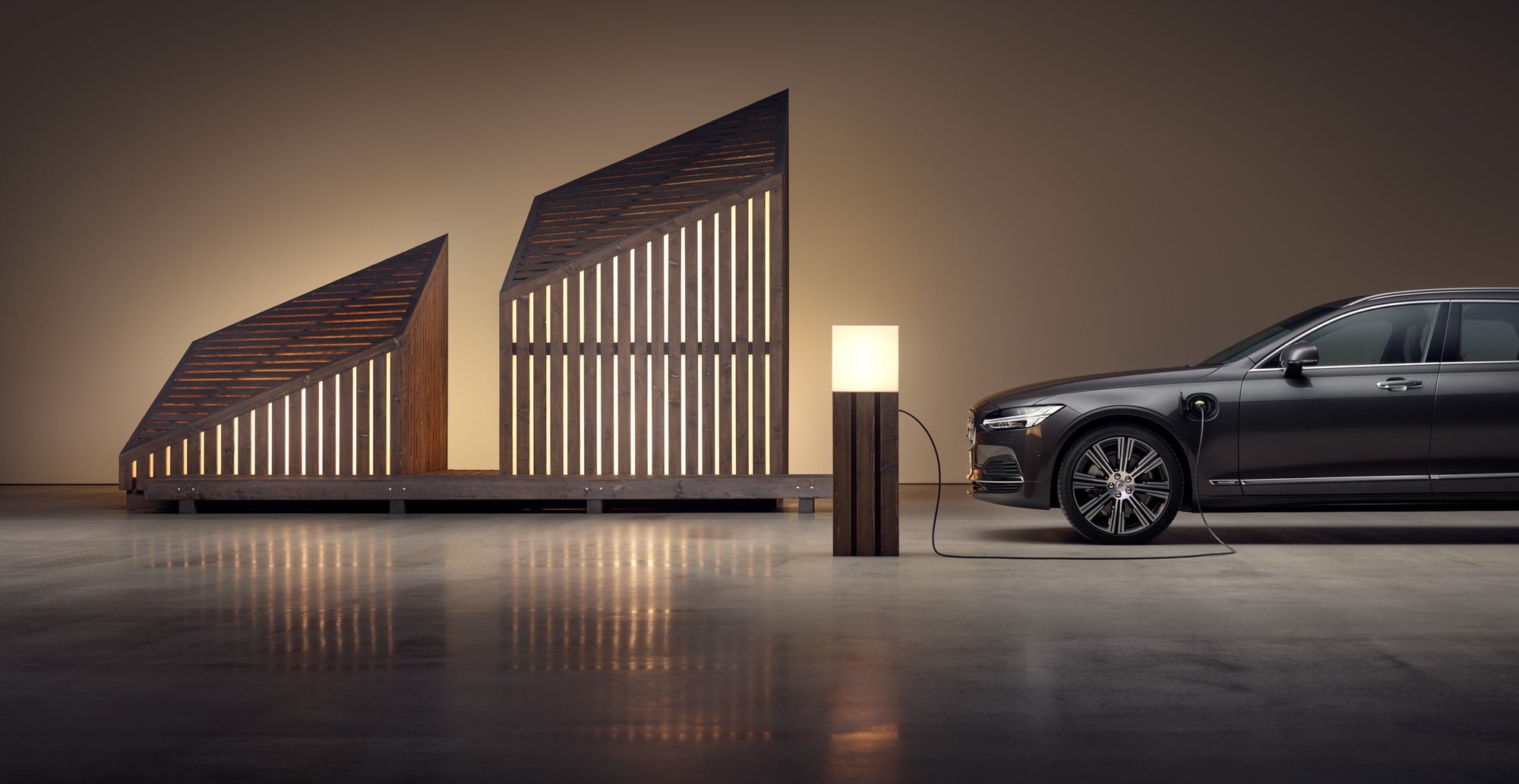 Volvo charging at charging post in interior environment