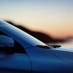 Volvo S60 in Power Blue bei Sonnenuntergang - Detailschuss Seitenspiegel