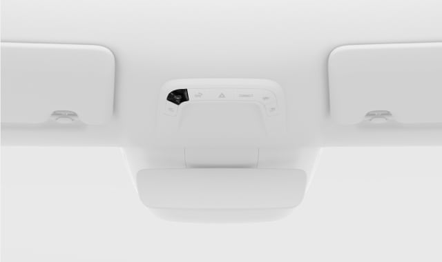 The auto lights off button in the overhead console