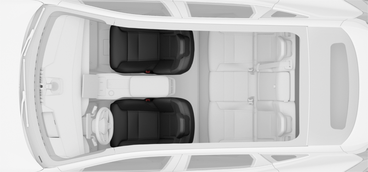 Top-down view of the vehicle with front seats in focus