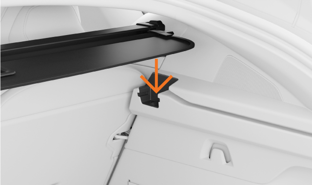 Pousser le cache-bagages dans les fentes