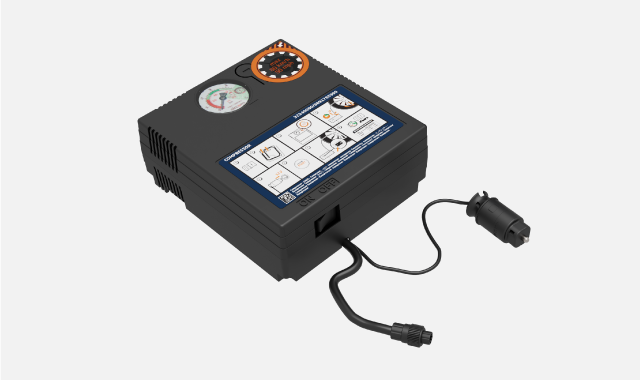 Overview of the temporary puncture repair kit's compressor.