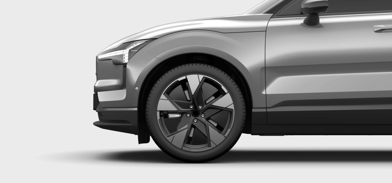 Side view of the car front and tyre.