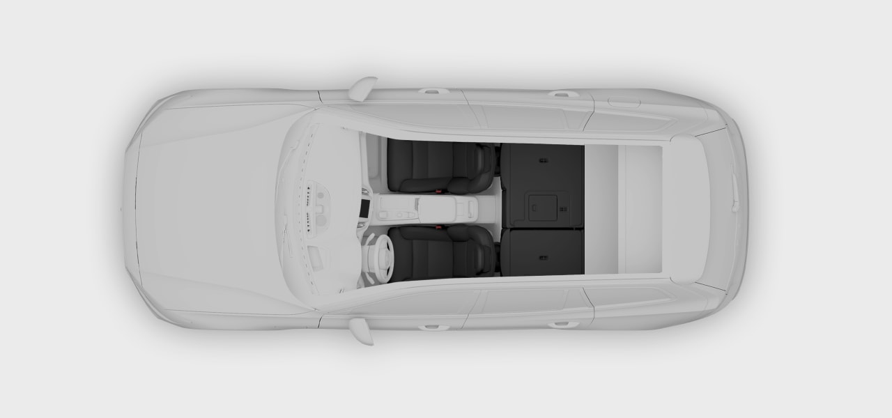 A top-down view of the vehicle with folded rear seats