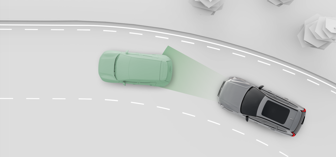 Two cars on a road from above