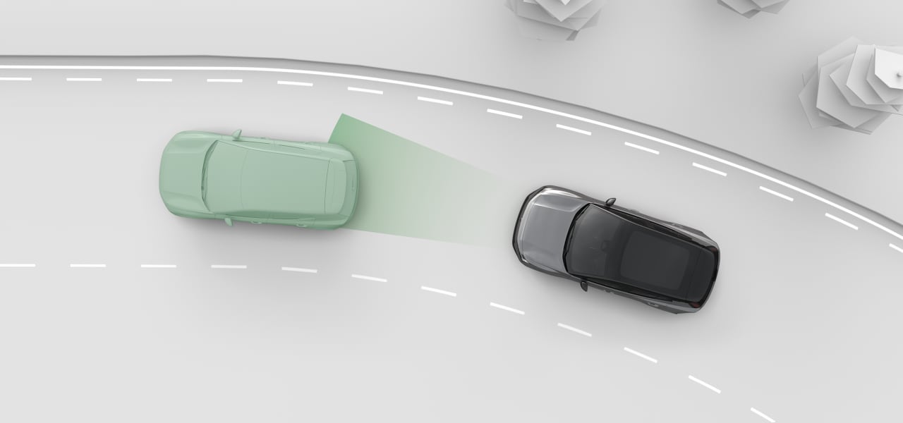 Two cars on a road from above