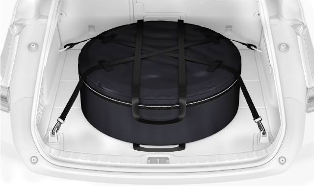 Spare wheel stored in the boot.