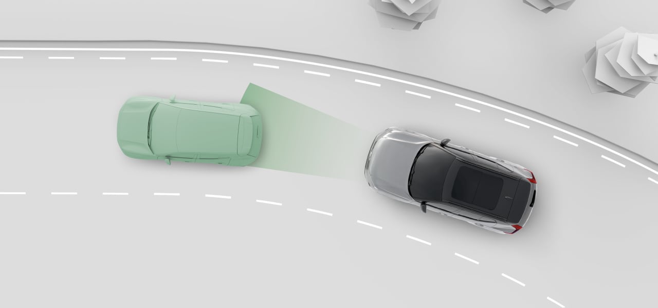 Two cars on a road from above