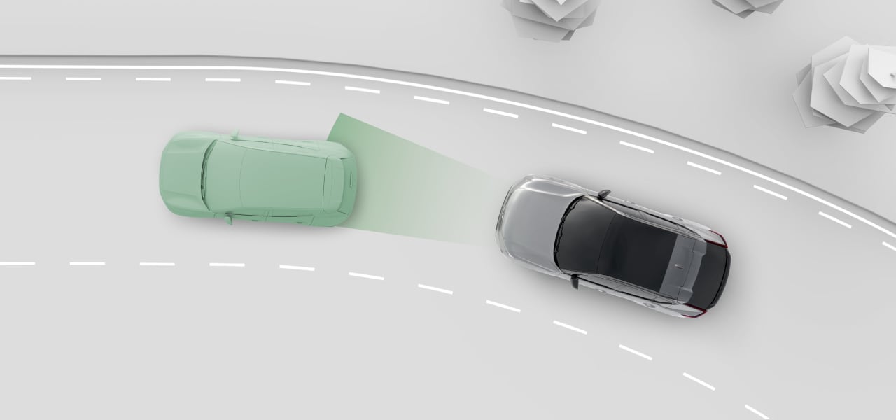 Two cars on a road from above