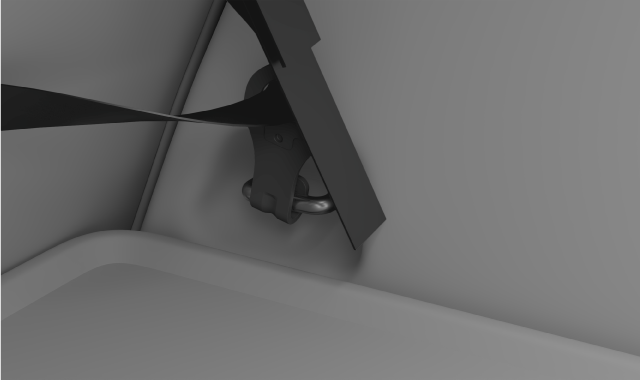 Net fastened to a load-retaining eyelet behind the seat.