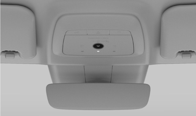 Bouton de dégivrage dans la console au pavillon
